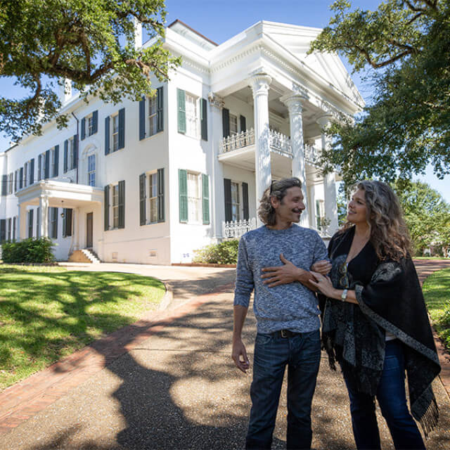 Walking the grounds of a historic property in Natchez, Mississippi