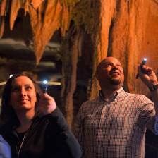 A family tours a cave in Kentucky