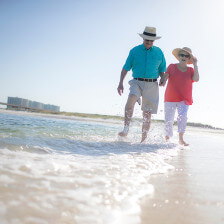 Walking in the Alabama surf on a Gulf of Mexico beach
