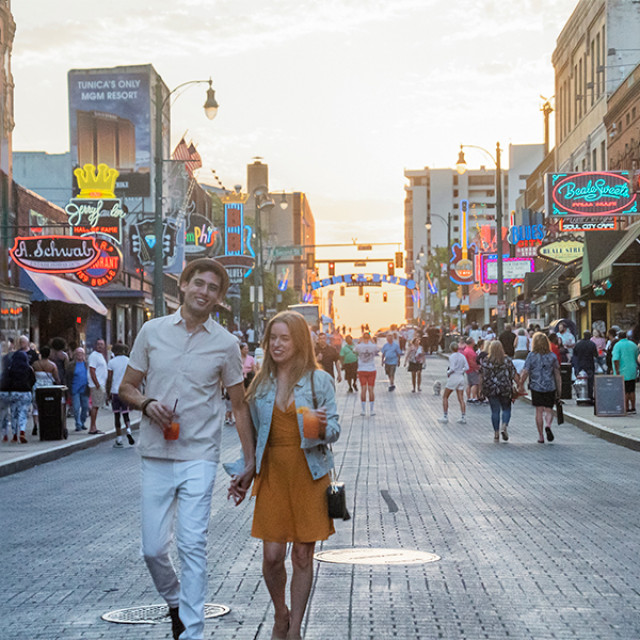 Strolling bustling Beale Street in Memphis, Tennessee