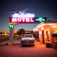 Neon signs glow outside the Blue Swallow Motel in Tucumcari, New Mexico