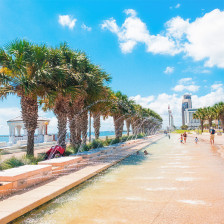 Families splash in fountains along the Corpus Christi Downtown Seawall