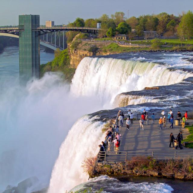 Standing atop Niagara Falls in Niagara Falls State Park, New York